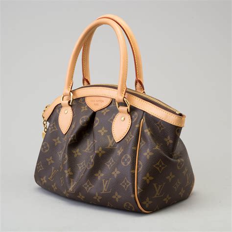 lv tivoli pm|LOUIS VUITTON TIVOLI PM .